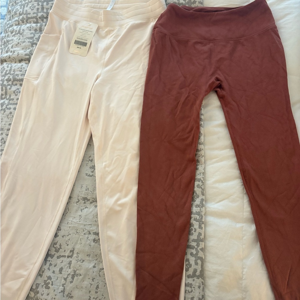 Fabletics Cream Jogger Pants and rust colored leggings